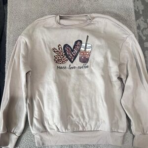 SHEIN Cream Crew Neck Sweater with Feather Graphic